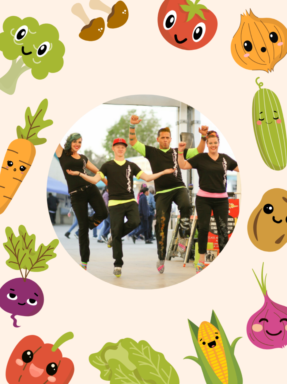 Group of dancers surrounded by cute vegetable illustrations.
