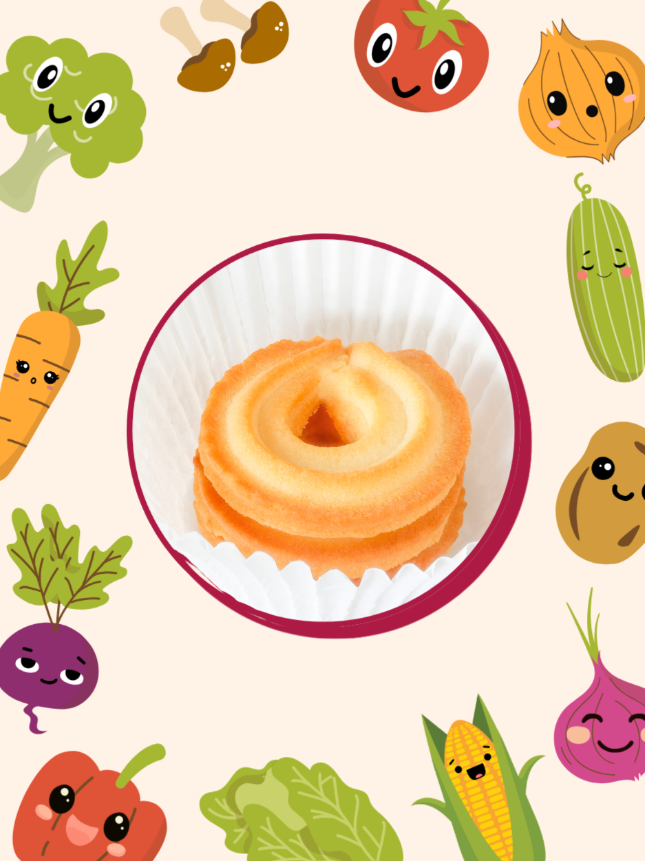 Clay craft cookies surrounded by vegetables.