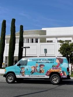 photo of the alhambra mobile library van in front of the library building