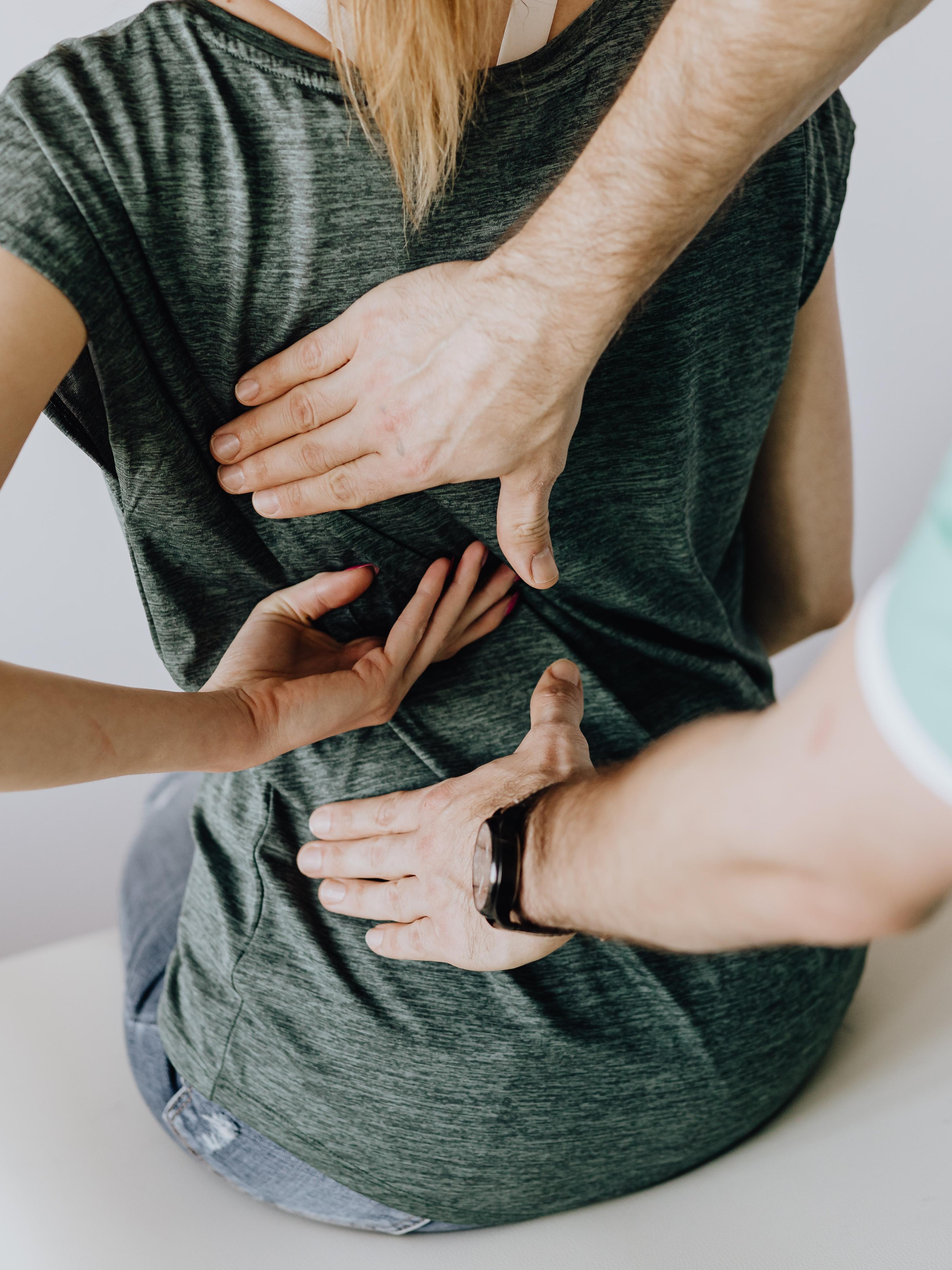 chiropractor working on someone's back