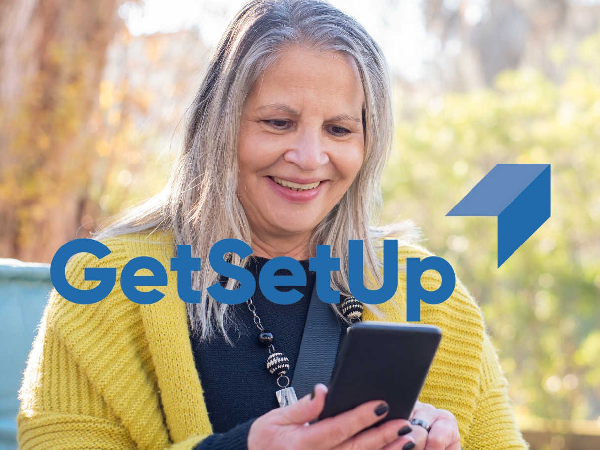 image of a woman using a cell phone with getsetup logo