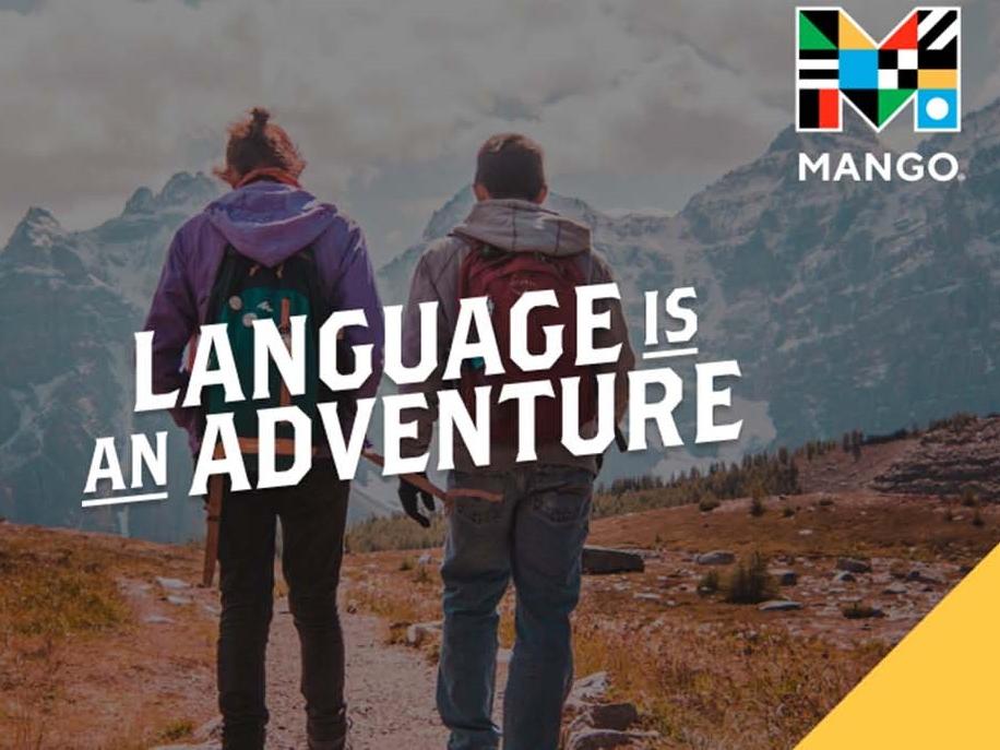 language is an adventure mango two people hiking in mountains